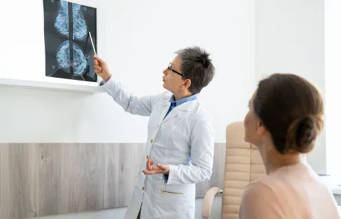 Doctor going over x-rays with patient